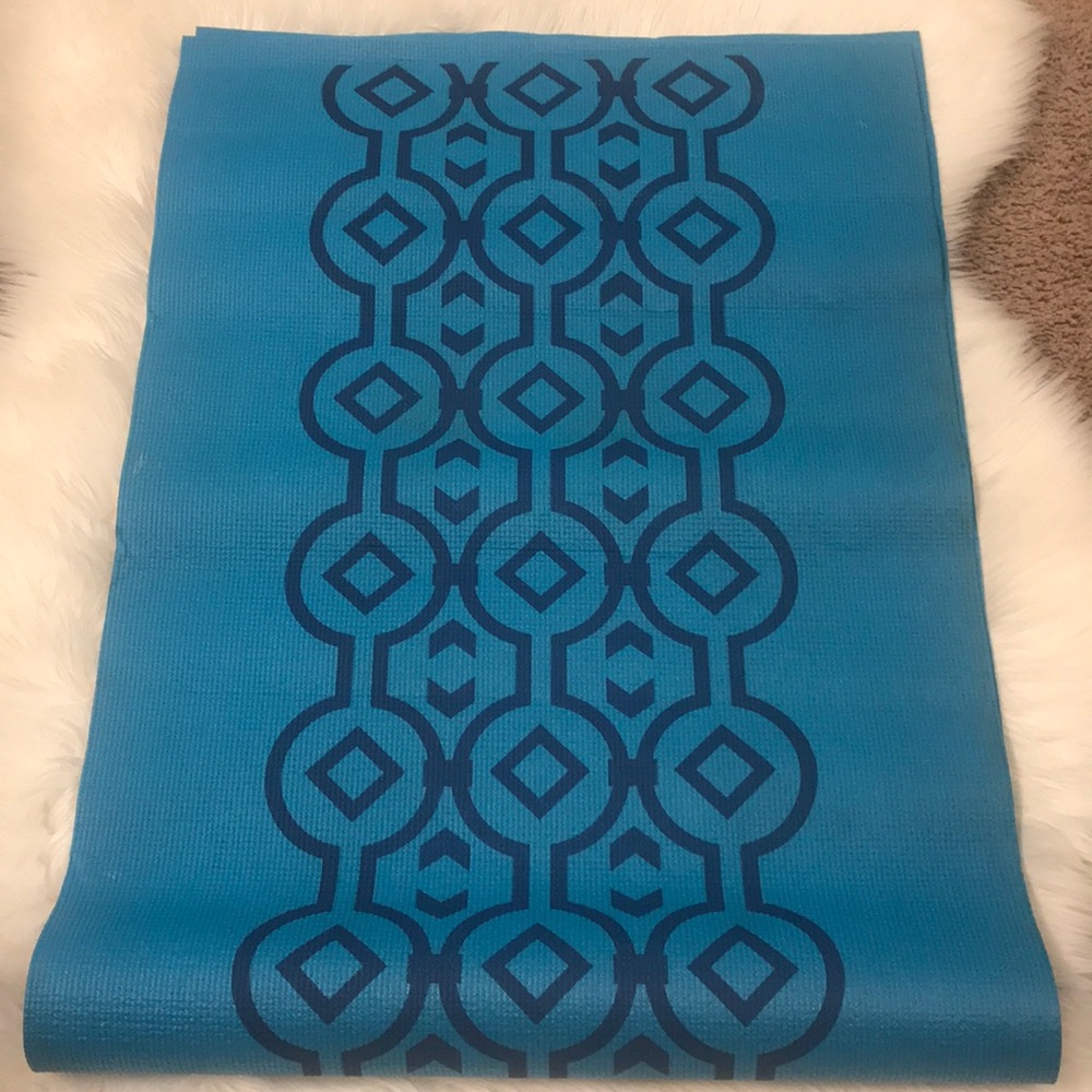 Lotus turquoise yoga mat with navy blue design